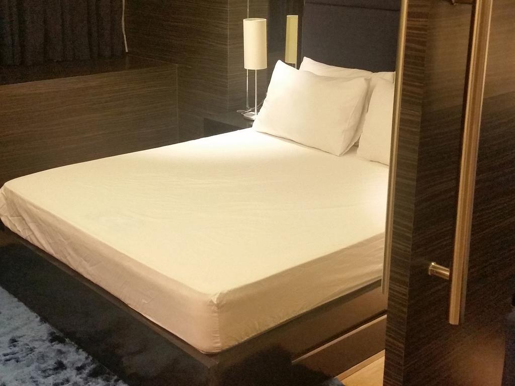 Shang Luxury Suites Mandaluyong Quarto foto